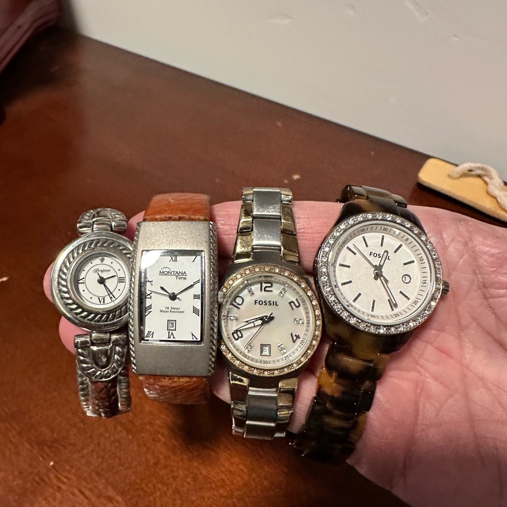 4 Ladies watches- 2 Fossil, 1 Montana Time bangle and a Brighton watch.